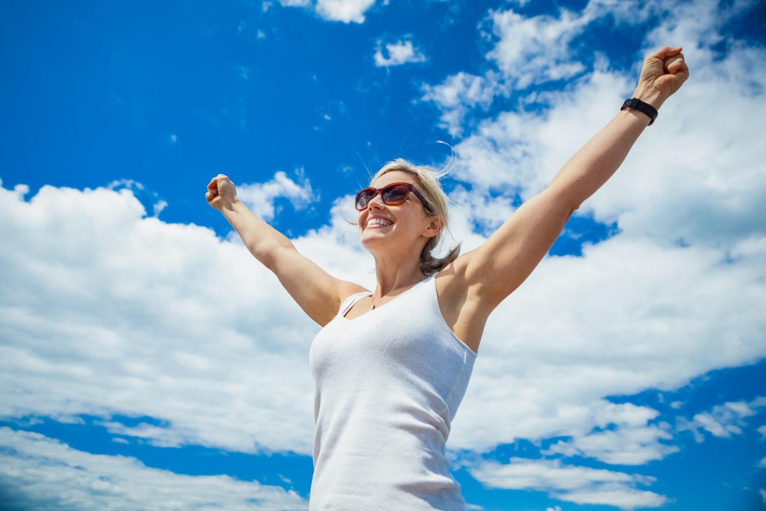 Beautiful Woman Carefree in Blue Sky Beautiful Woman Carefree in Blue Sky